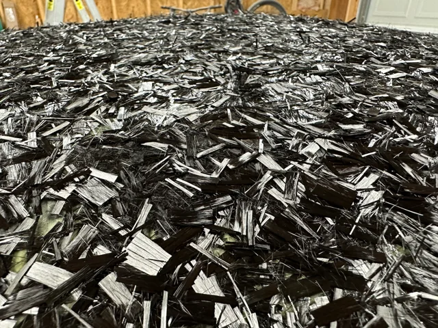 Chopped carbon fiber during the roof layup.